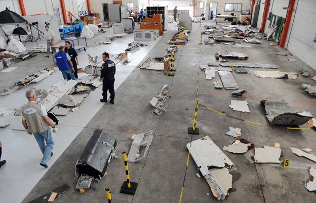 Debris from the Air France crash is laid out in a warehouse