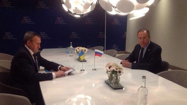 Russia's foreign ministry released this image of Sergei Lavrov meeting with Ukraine's Andriy Deshchytsia