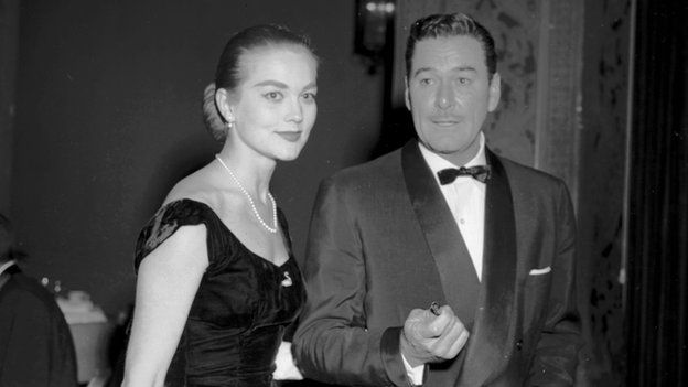 Errol Flynn with Patrice Wymore in 1956