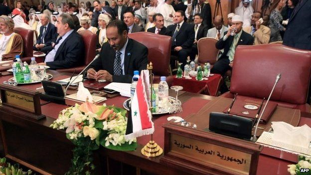 Empty seat for Syrian representative at Arab League summit in Kuwait (25 March 2014)