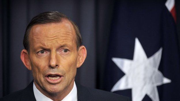 Australia"s Prime Minister Tony Abbott speaks to the media at Parliament House in the capital Canberra on March 25, 2014