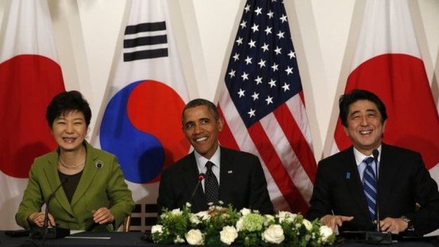 US President Barack Obama participates seen with President Park Geun-hye of the South Korea and Prime Minister Shinzo Abe of Japan after a meeting between the three leaders at the nuclear security summit in The Hague on 25 March 2014