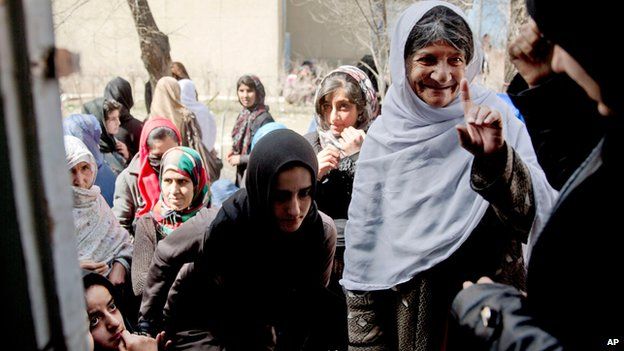 Afghan women queue to register to vote, Kabul (19 March)