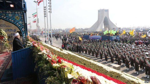 Iranian President Hassan Rouhani addresses security forces personnel in Tehran (11 February 2014)