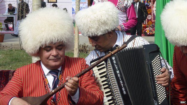 Turkmen musicians in large furry hats