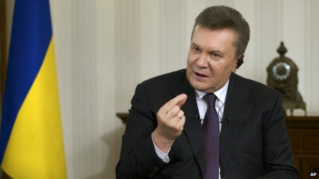 Ousted Ukrainian President Viktor Yanukovych gestures during a TV interview. Photo: 2 April 2014