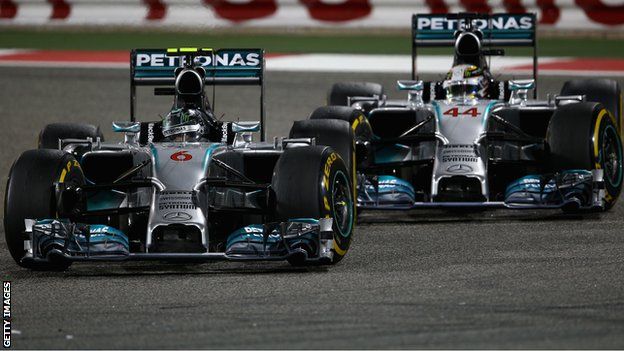 Nico Rosberg (L) and Mercedes team-mate Lewis Hamilton battle for the lead at Bahrain