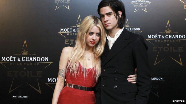 Peaches Geldof (L) and Thomas Cohen pose for photographers at the Moet and Chandon Etoile Award for Mario Testino at the Park Lane Hotel in London, England, in this September 19, 2011