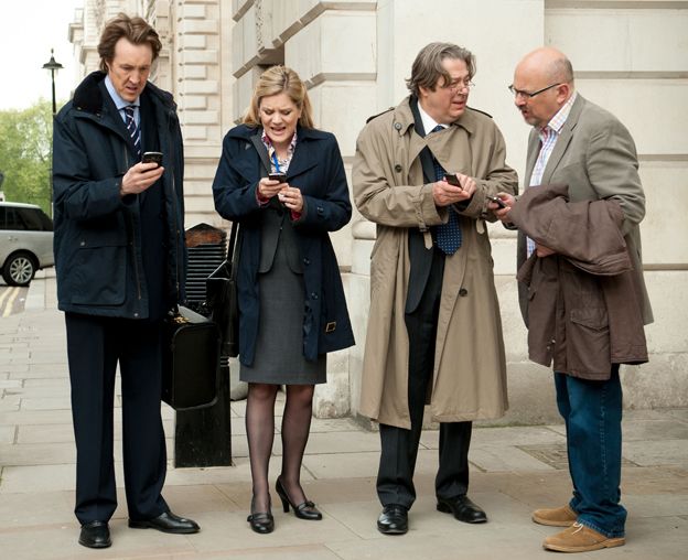 Phil Smith (Will Smith), Emma Messinger (Olivia Poulet), Peter Mannion MP (Roger Allam), Stewart Pearson (Vincent Franklin) in the Thick of It, Season Five.