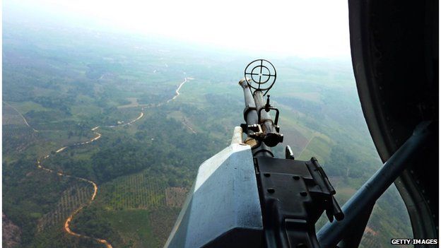 View from a military helicopter searching the Peruvian countryside for drug production