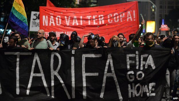 Demonstrators march to protest against the upcoming Brazil 2014 FIFA World Cup, in Sao Paulo, Brazil, on on 27 March 2014.