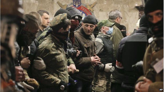 Pro-Russian activists occupy the regional police office in Donetsk, April 12