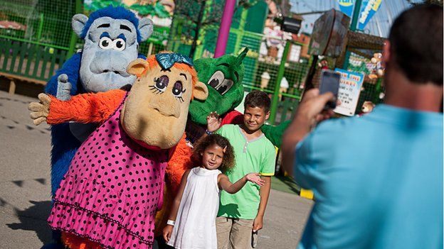 Children and characters at Adventure Island