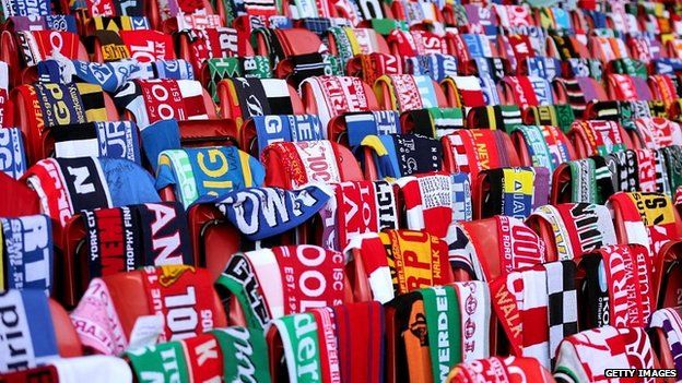 96 seats with scarves draped over them