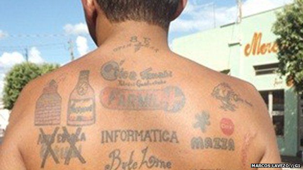 Brazil: Man 'earns a living' from tattoo ads - BBC News