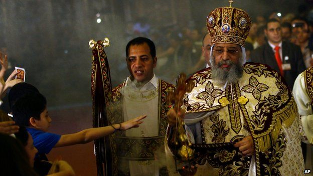 Coptic Pope Tawadros II celebrates Easter Eve service at St Mark's Cathedral in Cairo, Egypt, on 19 April 2014