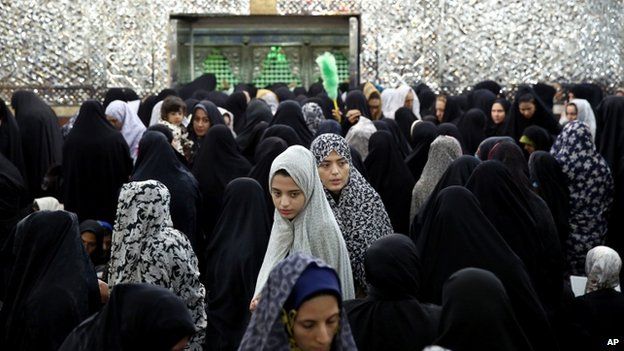 Iranian Shiite women gather at the shrine of the Shiite Saint Imam Abdulazim, in Shahr-e-Ray, south of Tehran, Iran, 3 April 2014