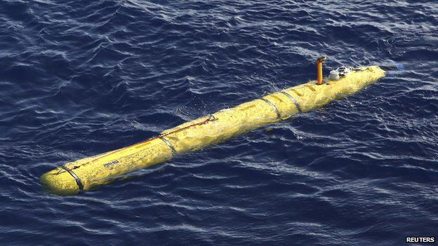 The Bluefin-21 Autonomous Underwater Vehicle sits in the water after being deployed from the Australian Defence Vessel Ocean Shield in the southern Indian Ocean during the continuing search for the missing Malaysian Airlines flight MH370 in this picture released by the Australian Defence Force April 17