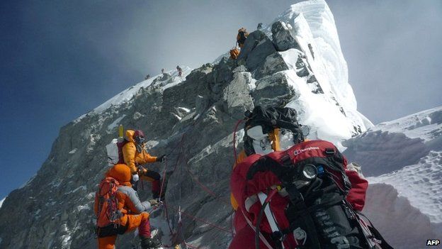 Mountaineers approach the Hillary Step while pushing for the summit of Mount Everest - 19 May 2009