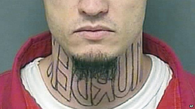 Man on trial for murder wants 'murder' tattoo removed from neck