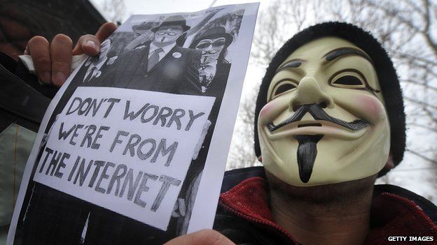 A protester wearing an Anonymous Guy Fawkes mask takes part in a demonstration in Zagreb, Croatia, on 11 February 2012