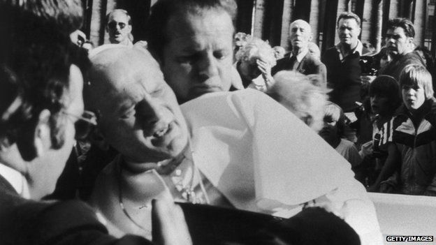 Pope John Paul II after being shot by would-be assassin Mehmet Ali Agca in St Peter's Square on 13 May 1981