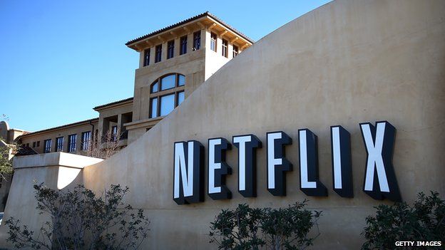 A sign is posted in front of Netflix headquarters in Los Gatos, California, on 22 January 2014