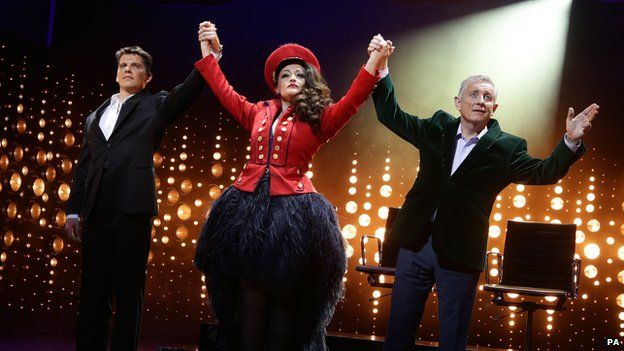 (Left to right) Nigel Harman (as Simon Cowell), Victoria Elliott (as Jordy) and Ashley Knight (as Louis Walsh)