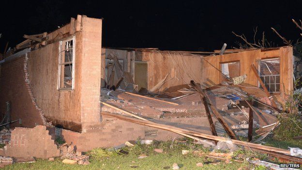 A damaged house is seen after a tornado hit the town of Mayflower, Arkansas, on 27 April