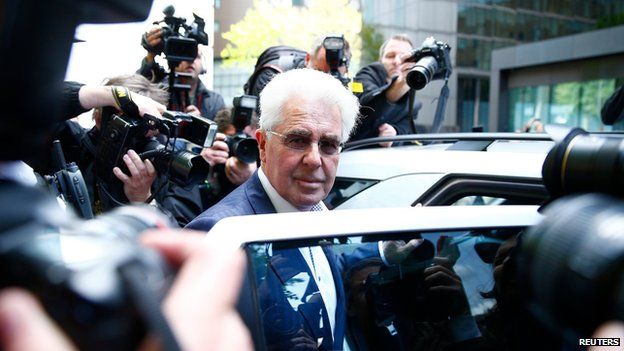Max Clifford leaving court