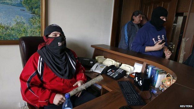 Pro-Russia activists inside the regional government's headquarters in Luhansk (29 April 2014)