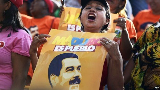 Supporters of Venezuelan President Nicolas Maduro are seen during an event celebrating his first year of government at Miraflores presidential palace in Caracas on 15 April 15, 2014