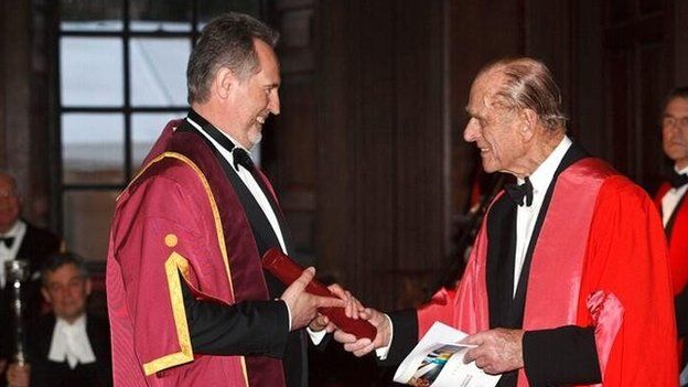File photo of Dmytro Firtash (L) with the Duke of Edinburgh at Cambridge University