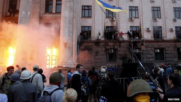 People wait to be rescued from Trade Unions House in Odessa - 2 May 2014