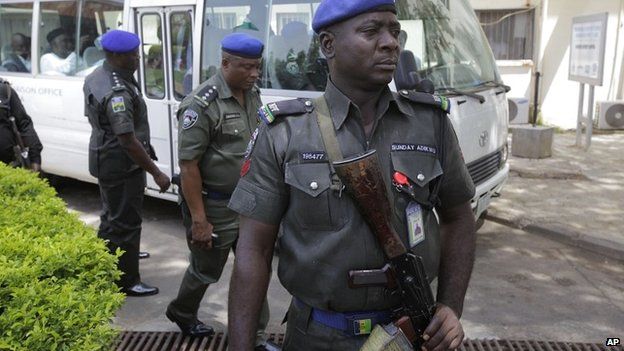 Security men stand guard outside a hospital in Abuja - 16 April 2014