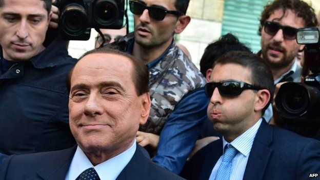 Silvio Berlusconi leaves the Milan's justice office (23 April 2014)