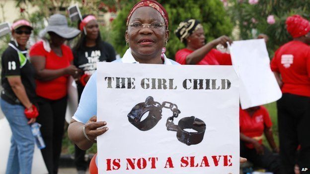 A woman at a demonstration calling on the government to increase efforts to rescue the 276 missing kidnapped school girls of a government secondary school Chibok, in Lagos