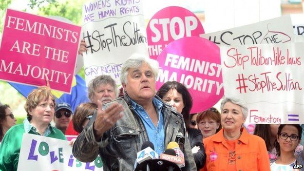 Jay Leno speaks at a gathering of Women's Rights and LGBT groups protesting across from the Beverly Hills Hotel, 5 May 2014