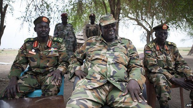 South Sudanese rebel leader and former vice president Riek Machar (C) attends an interview in Nasir on 14 April 2014