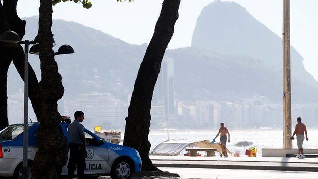 Police watch out over Copacabana beach in Rio