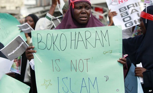 A woman attends a demonstration calling on the government to increase efforts to rescue more than 200 kidnapped schoolgirls in Lagos, Nigeria - Monday 5 May 2014