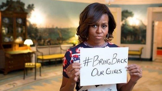 Michelle Obama with sign "#BringBackOurGirls"