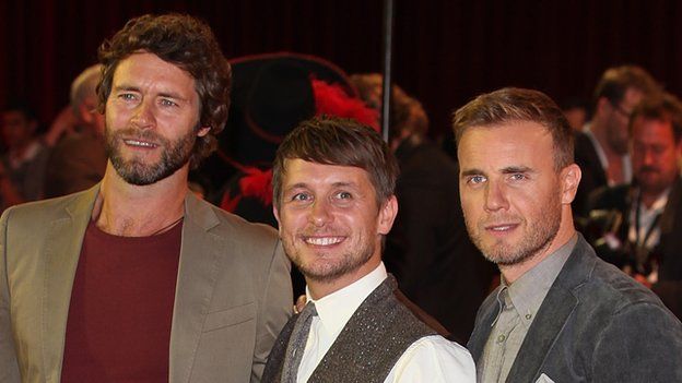 (l-r) Howard Donald, Mark Owen and Gary Barlow at a London film premiere in 2011