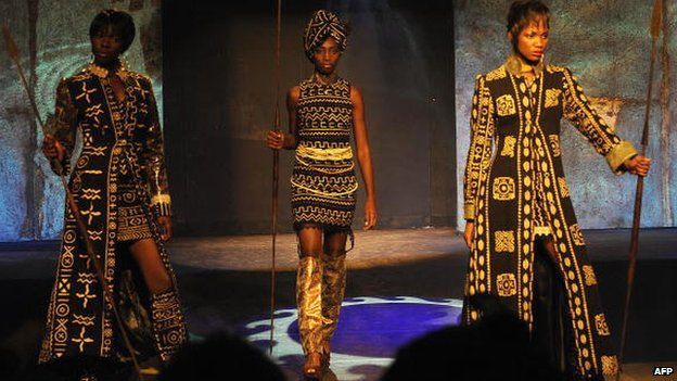 A model presents a creation by designer Kofi Ansah, during the Festival for African Fashion and Arts fashion show in April 2009 in Nairobi, Kenya