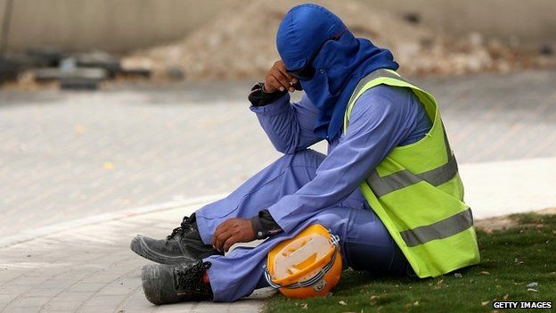 A construction worker takes a break in Qatar - 10 May 2014