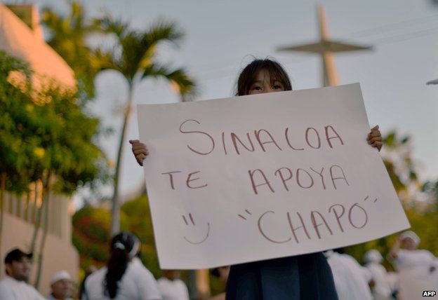 People protest in support of Mexican drug kingpin Joaquin Guzman Loera, aka 'el Chapo Guzman' at Culiacan, Sinaloa State, Mexico on February 26, 2014