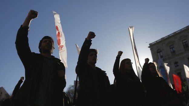 Members of the youth section of the General Confederation of Portuguese Workers (CGTP) union shout slogans during a demonstration against the government's austerity measures