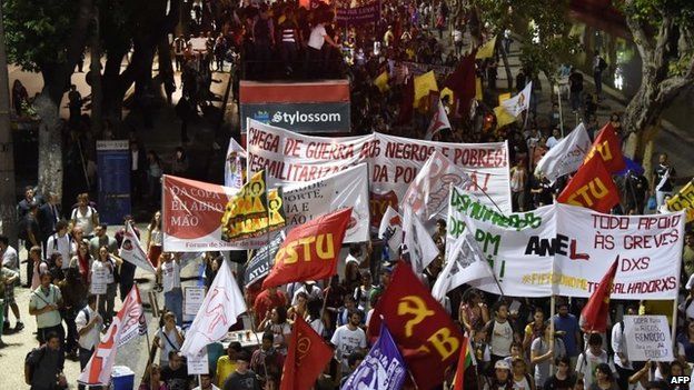 People march during a protest in Rio de Janeiro on May 15, 2014.