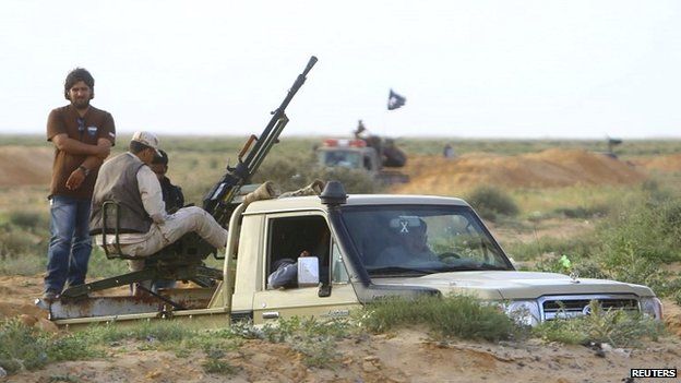 Libyan rebels on the outskirts of Ajdabiya - 22 March 2014