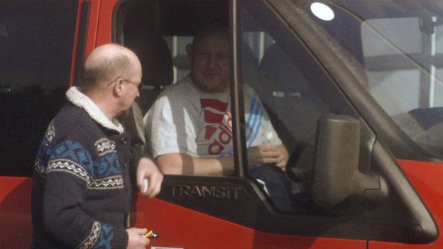 Matthew Roberts at the wheel of a prison van prepares to take a sample of drugs from Colin Beck